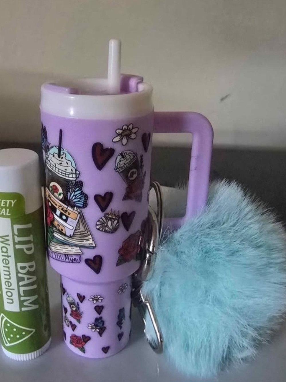Lilac Stickered Travel Tumbler with Lip Balm & Blue Fuzzy Pom Keychain,